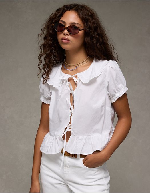 Blusa con cuello, mangas abullonadas y lazo delantero Ae