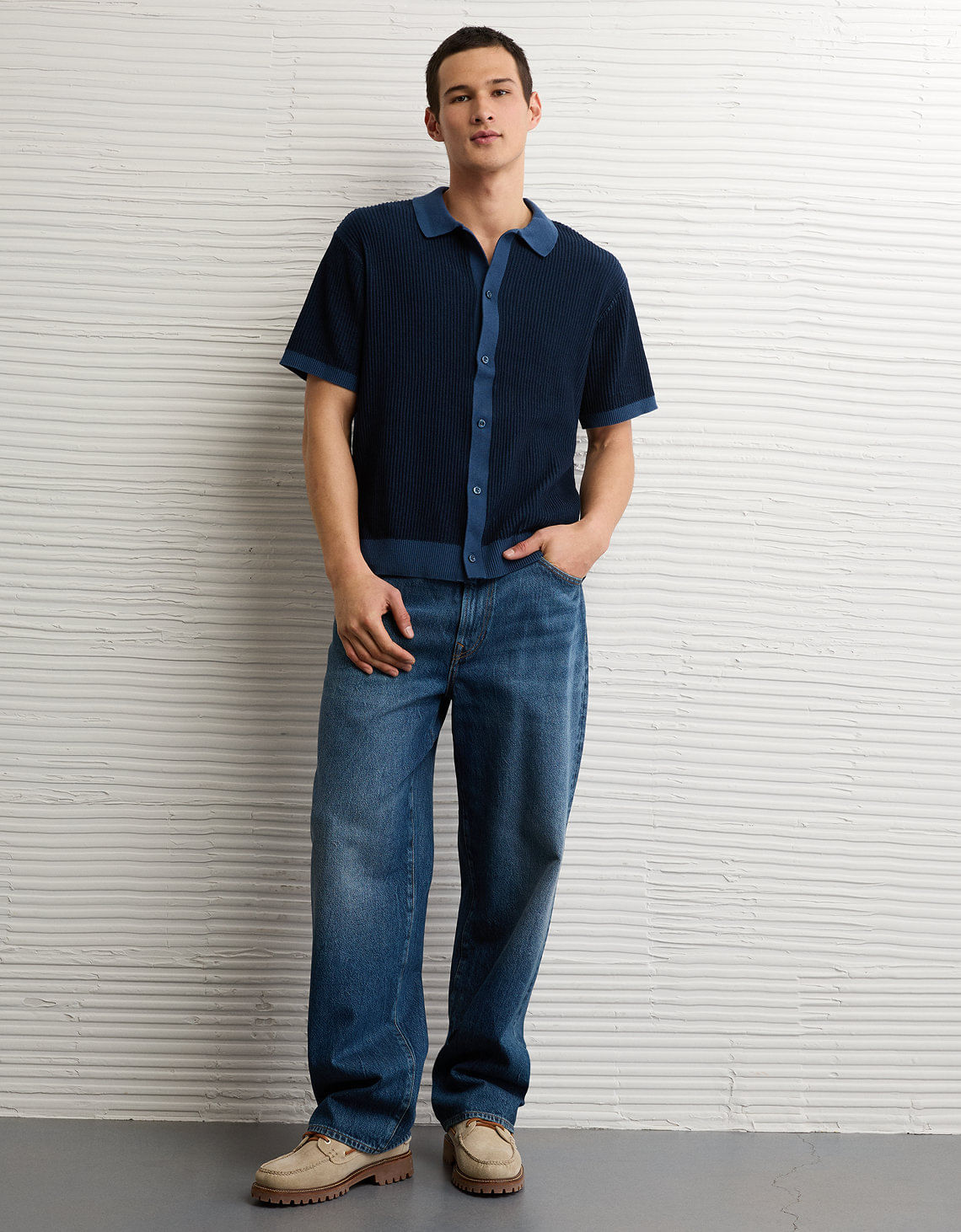 Suéter polo abotonado a rayas de Ae