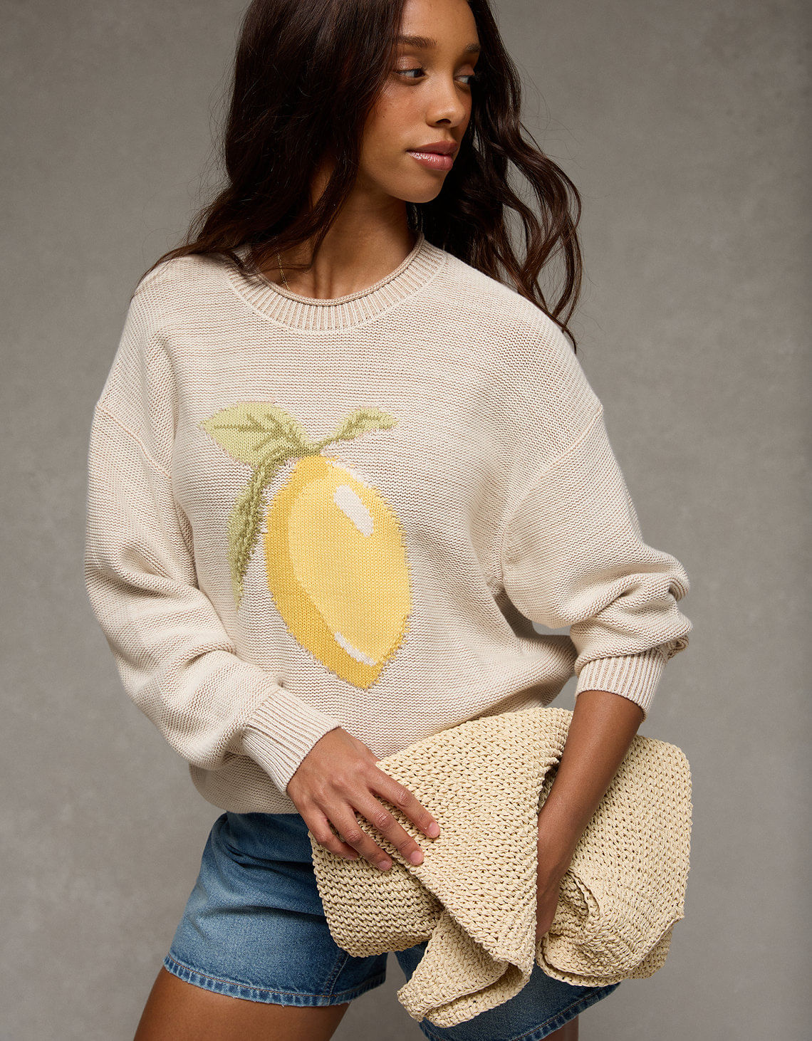 Suéter tejido oversized con gráfico Ae