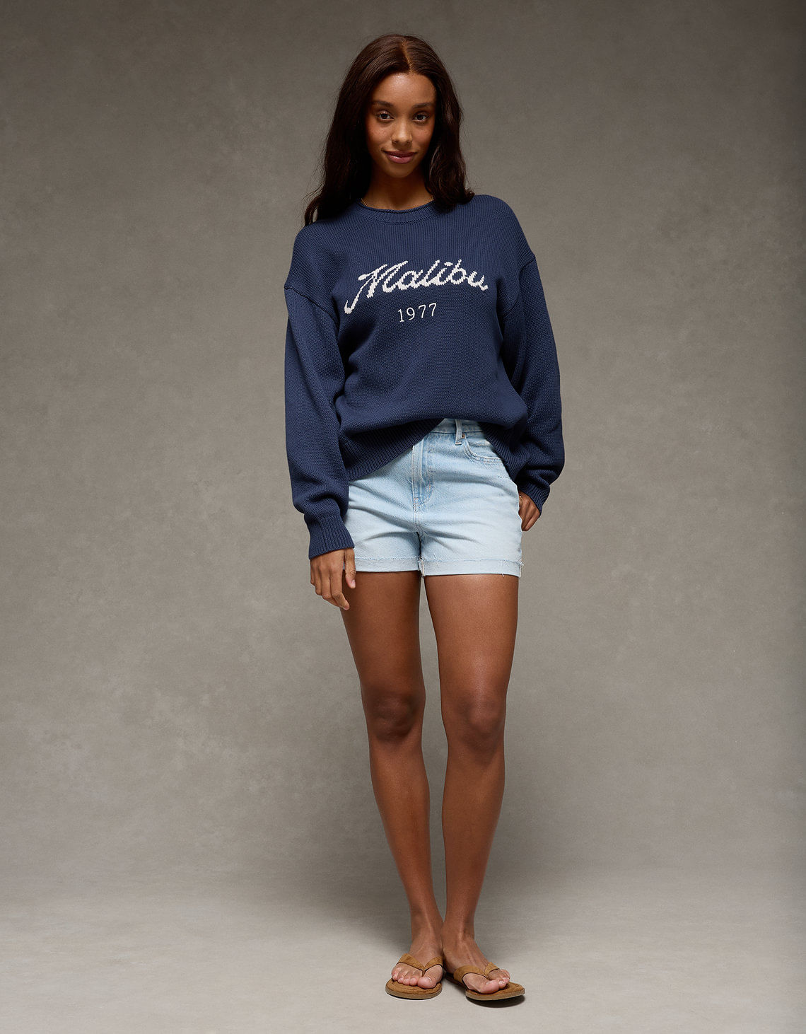 Suéter tejido oversized con gráfico Ae
