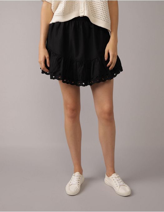 Falda mini de tiro alto bordada con ojales